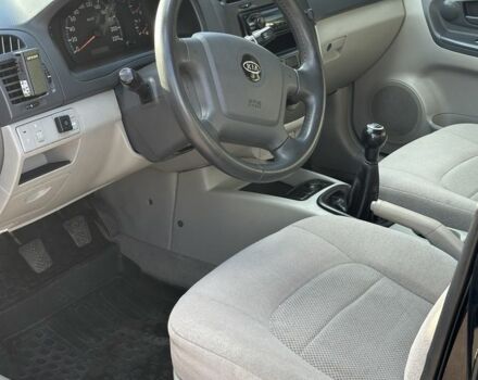 Черный Киа Черато, объемом двигателя 1.6 л и пробегом 245 тыс. км за 2850 $, фото 7 на Automoto.ua