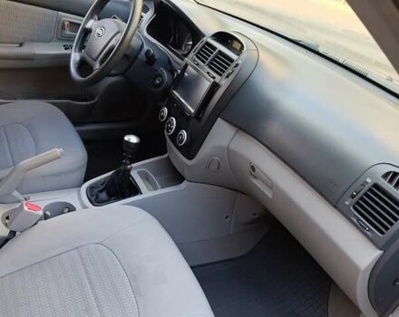 Чорний Кіа Черато, об'ємом двигуна 1.6 л та пробігом 237 тис. км за 5300 $, фото 18 на Automoto.ua