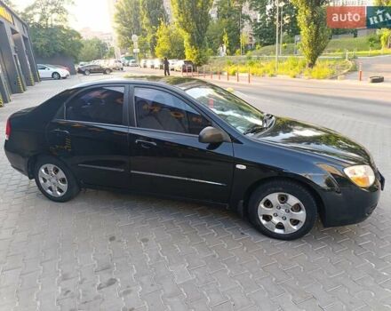 Чорний Кіа Черато, об'ємом двигуна 1.6 л та пробігом 237 тис. км за 5300 $, фото 3 на Automoto.ua
