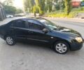 Чорний Кіа Черато, об'ємом двигуна 1.6 л та пробігом 237 тис. км за 5300 $, фото 3 на Automoto.ua