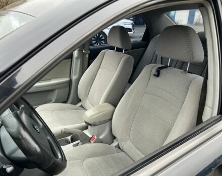 Черный Киа Черато, объемом двигателя 1.6 л и пробегом 230 тыс. км за 3200 $, фото 11 на Automoto.ua