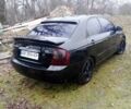 Черный Киа Черато, объемом двигателя 2 л и пробегом 240 тыс. км за 4200 $, фото 6 на Automoto.ua