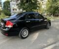 Черный Киа Черато, объемом двигателя 1.6 л и пробегом 181 тыс. км за 3900 $, фото 1 на Automoto.ua