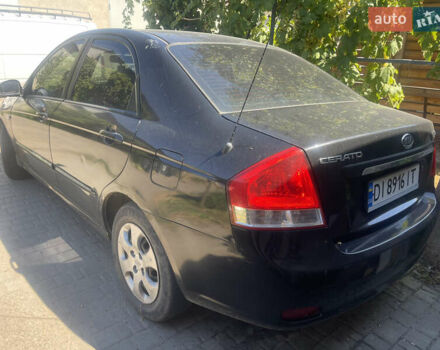 Чорний Кіа Черато, об'ємом двигуна 1.59 л та пробігом 202 тис. км за 2999 $, фото 2 на Automoto.ua