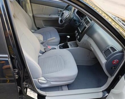 Чорний Кіа Черато, об'ємом двигуна 1.6 л та пробігом 237 тис. км за 5300 $, фото 17 на Automoto.ua