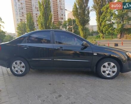 Чорний Кіа Черато, об'ємом двигуна 1.6 л та пробігом 237 тис. км за 5300 $, фото 4 на Automoto.ua