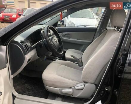 Чорний Кіа Черато, об'ємом двигуна 2 л та пробігом 177 тис. км за 4399 $, фото 13 на Automoto.ua