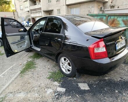 Чорний Кіа Черато, об'ємом двигуна 2 л та пробігом 230 тис. км за 4000 $, фото 1 на Automoto.ua