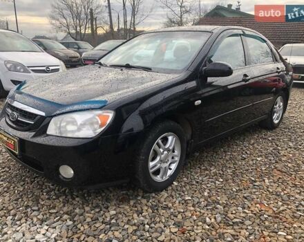 Чорний Кіа Черато, об'ємом двигуна 2 л та пробігом 177 тис. км за 4399 $, фото 2 на Automoto.ua