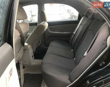 Чорний Кіа Черато, об'ємом двигуна 2 л та пробігом 177 тис. км за 4399 $, фото 15 на Automoto.ua