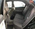 Чорний Кіа Черато, об'ємом двигуна 2 л та пробігом 177 тис. км за 4399 $, фото 15 на Automoto.ua