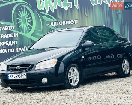 Чорний Кіа Черато, об'ємом двигуна 2 л та пробігом 319 тис. км за 4300 $, фото 2 на Automoto.ua