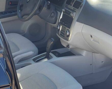 Черный Киа Черато, объемом двигателя 2 л и пробегом 268 тыс. км за 4200 $, фото 12 на Automoto.ua