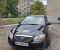 Черный Киа Черато, объемом двигателя 1.6 л и пробегом 182 тыс. км за 5000 $, фото 1 на Automoto.ua