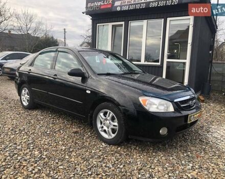 Чорний Кіа Черато, об'ємом двигуна 2 л та пробігом 177 тис. км за 4399 $, фото 9 на Automoto.ua