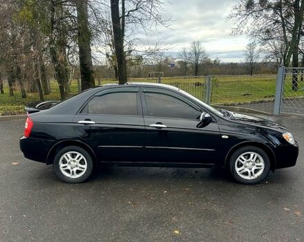 Черный Киа Черато, объемом двигателя 2 л и пробегом 232 тыс. км за 4100 $, фото 4 на Automoto.ua