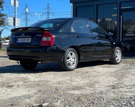 Черный Киа Черато, объемом двигателя 2 л и пробегом 268 тыс. км за 4200 $, фото 5 на Automoto.ua