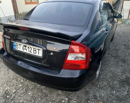 Черный Киа Черато, объемом двигателя 2 л и пробегом 240 тыс. км за 3300 $, фото 2 на Automoto.ua