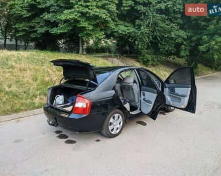 Чорний Кіа Черато, об'ємом двигуна 1.5 л та пробігом 221 тис. км за 4200 $, фото 8 на Automoto.ua