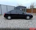 Чорний Кіа Черато, об'ємом двигуна 1.6 л та пробігом 200 тис. км за 3300 $, фото 3 на Automoto.ua