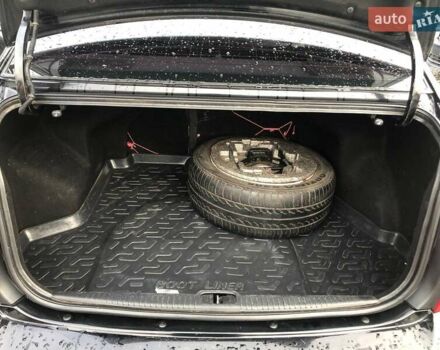 Чорний Кіа Черато, об'ємом двигуна 2 л та пробігом 177 тис. км за 4399 $, фото 19 на Automoto.ua