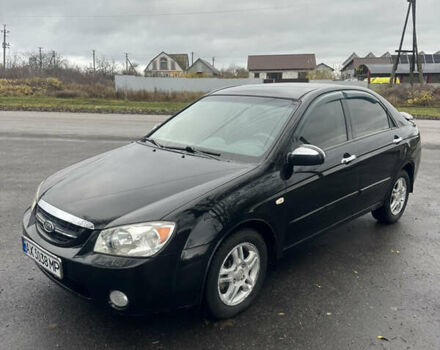 Черный Киа Черато, объемом двигателя 1.98 л и пробегом 236 тыс. км за 4100 $, фото 1 на Automoto.ua