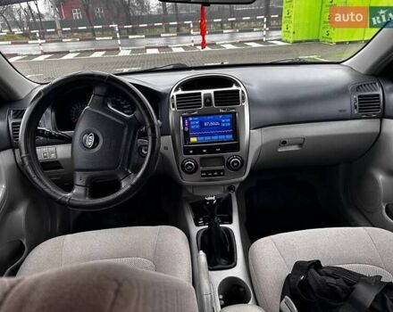 Черный Киа Черато, объемом двигателя 1.98 л и пробегом 190 тыс. км за 3850 $, фото 3 на Automoto.ua