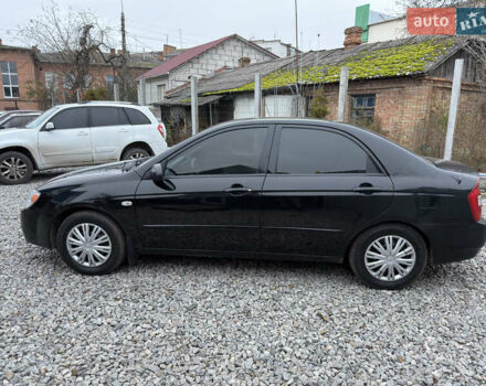 Черный Киа Черато, объемом двигателя 1.6 л и пробегом 220 тыс. км за 3300 $, фото 11 на Automoto.ua