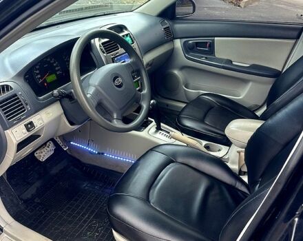 Черный Киа Черато, объемом двигателя 2 л и пробегом 232 тыс. км за 4100 $, фото 8 на Automoto.ua