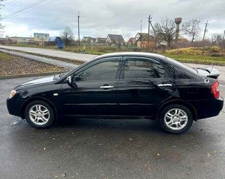 Черный Киа Черато, объемом двигателя 2 л и пробегом 232 тыс. км за 4100 $, фото 5 на Automoto.ua