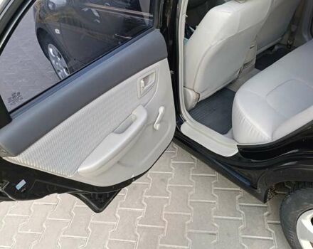 Чорний Кіа Черато, об'ємом двигуна 1.6 л та пробігом 237 тис. км за 5300 $, фото 21 на Automoto.ua