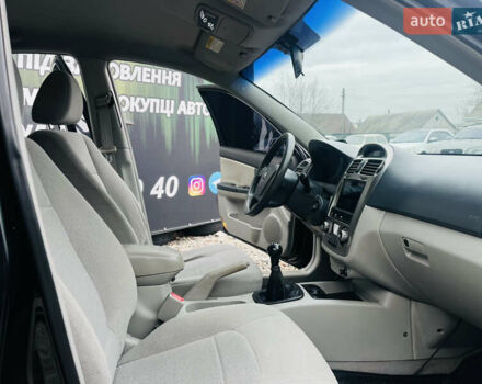 Чорний Кіа Черато, об'ємом двигуна 2 л та пробігом 319 тис. км за 4300 $, фото 18 на Automoto.ua