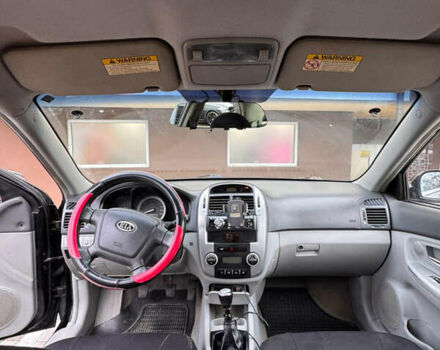 Черный Киа Черато, объемом двигателя 1.6 л и пробегом 232 тыс. км за 4300 $, фото 16 на Automoto.ua