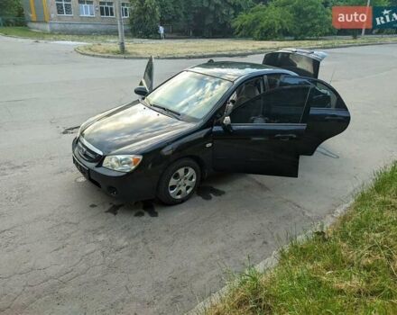 Чорний Кіа Черато, об'ємом двигуна 1.5 л та пробігом 221 тис. км за 4200 $, фото 6 на Automoto.ua