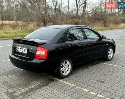Чорний Кіа Черато, об'ємом двигуна 1.98 л та пробігом 177 тис. км за 3950 $, фото 8 на Automoto.ua