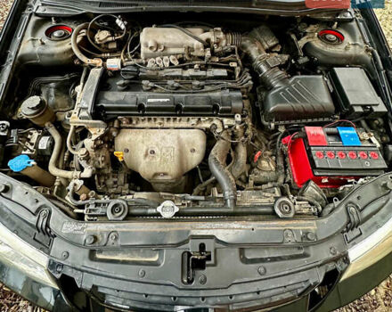 Чорний Кіа Черато, об'ємом двигуна 1.98 л та пробігом 240 тис. км за 5100 $, фото 14 на Automoto.ua