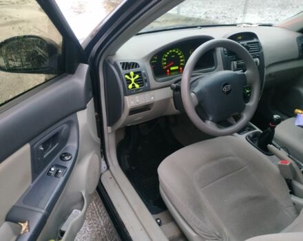 Черный Киа Черато, объемом двигателя 0 л и пробегом 210 тыс. км за 2500 $, фото 7 на Automoto.ua