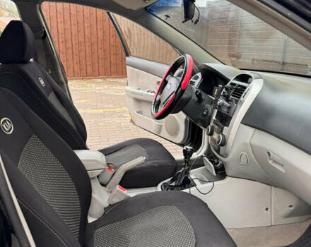 Черный Киа Черато, объемом двигателя 1.6 л и пробегом 232 тыс. км за 4300 $, фото 15 на Automoto.ua