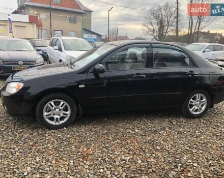 Чорний Кіа Черато, об'ємом двигуна 2 л та пробігом 177 тис. км за 4399 $, фото 3 на Automoto.ua