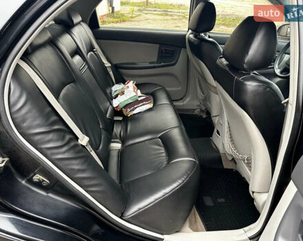 Чорний Кіа Черато, об'ємом двигуна 1.98 л та пробігом 240 тис. км за 5100 $, фото 9 на Automoto.ua