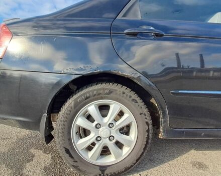 Черный Киа Черато, объемом двигателя 1.6 л и пробегом 258 тыс. км за 4300 $, фото 3 на Automoto.ua