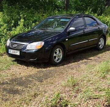 Черный Киа Черато, объемом двигателя 1.59 л и пробегом 273 тыс. км за 4200 $, фото 1 на Automoto.ua