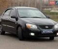 Чорний Кіа Черато, об'ємом двигуна 1.6 л та пробігом 224 тис. км за 4900 $, фото 3 на Automoto.ua