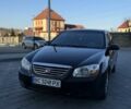 Черный Киа Черато, объемом двигателя 1.6 л и пробегом 225 тыс. км за 4400 $, фото 1 на Automoto.ua