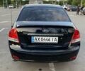 Чорний Кіа Черато, об'ємом двигуна 1.6 л та пробігом 264 тис. км за 4370 $, фото 2 на Automoto.ua