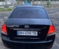 Чорний Кіа Черато, об'ємом двигуна 1.6 л та пробігом 337 тис. км за 5000 $, фото 3 на Automoto.ua