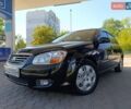 Черный Киа Черато, объемом двигателя 1.59 л и пробегом 219 тыс. км за 4600 $, фото 2 на Automoto.ua