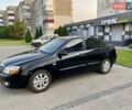 Чорний Кіа Черато, об'ємом двигуна 1.6 л та пробігом 111 тис. км за 4200 $, фото 4 на Automoto.ua
