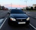 Чорний Кіа Черато, об'ємом двигуна 1.6 л та пробігом 294 тис. км за 2798 $, фото 1 на Automoto.ua