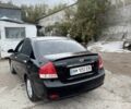 Черный Киа Черато, объемом двигателя 1.6 л и пробегом 126 тыс. км за 5200 $, фото 2 на Automoto.ua